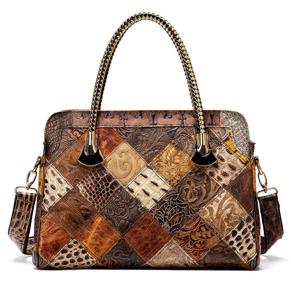 Patchwork leather handbag with intricate patterns on a white background