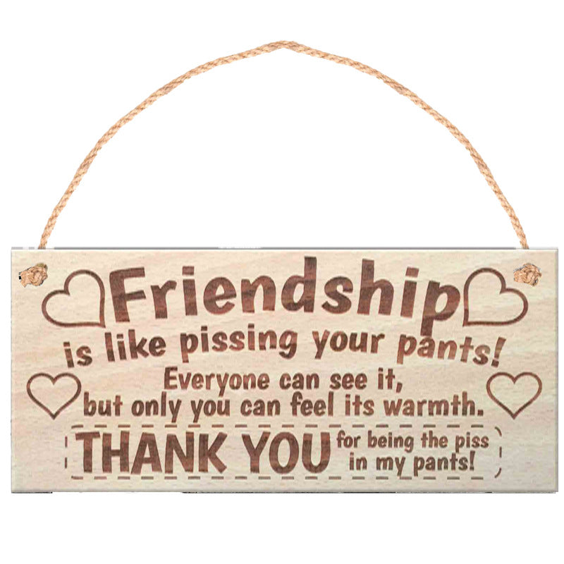 Wooden sign with humorous friendship quote on a white background