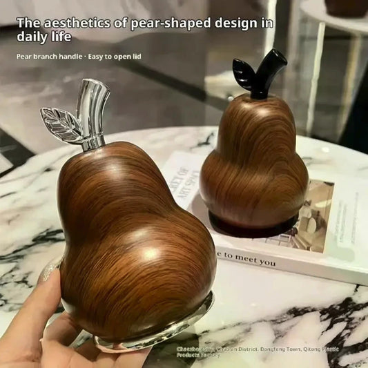 Two pear-shaped design items on a marble surface with text about their features.