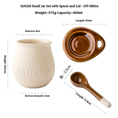 SUGAR small jar set with spoon and lid on a white background