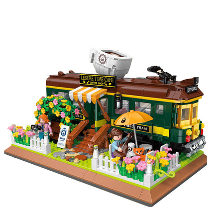 LEGO model of a tram stop with a cafe and people around