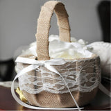 Decorative basket with lace and a white ribbon on a blurred background