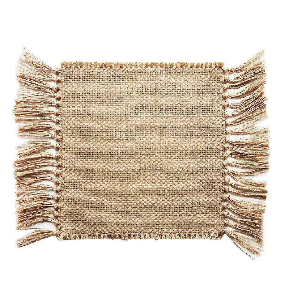 Beige woven placemat with fringe edges on a white background