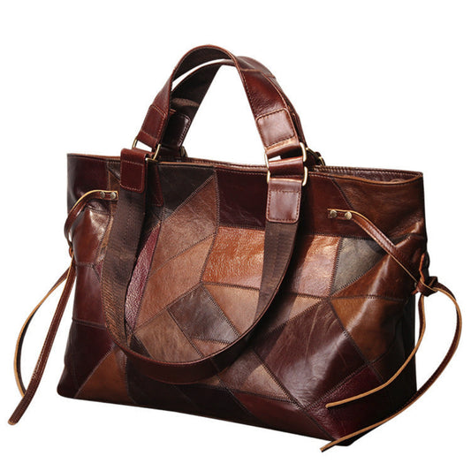 Brown leather patchwork handbag on a white background