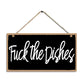 Hanging sign with text 'Fuck the Dishes' on a black background