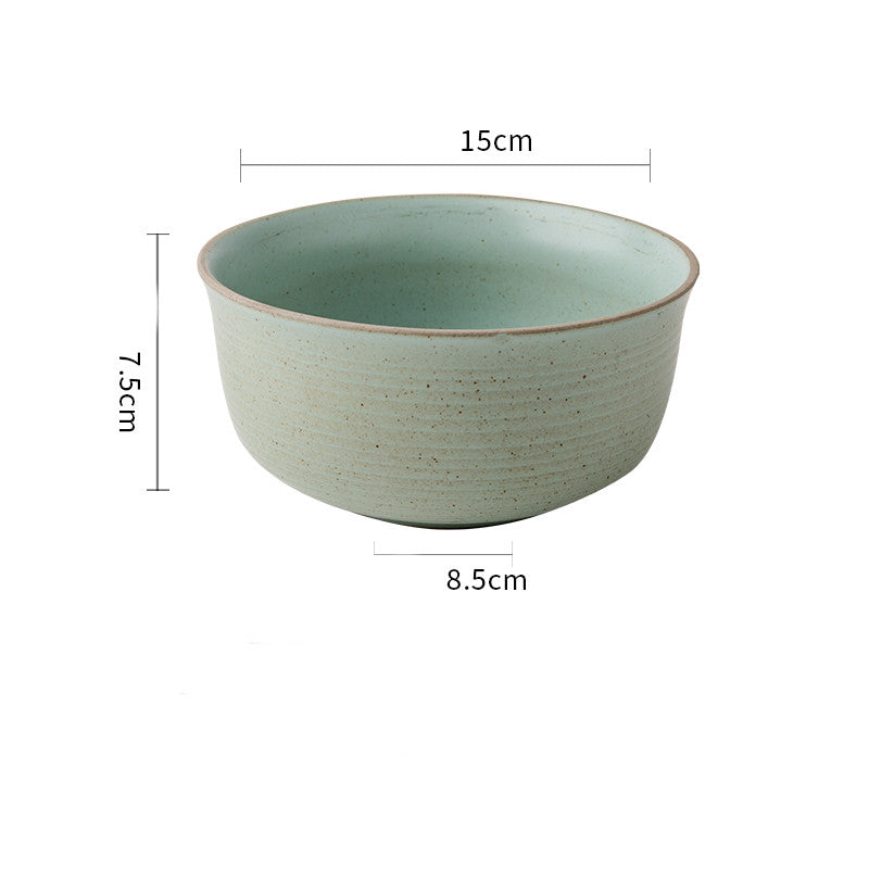 Green ceramic bowl with dimensions on a white background