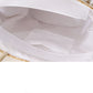 White material inside vintage straw shoulderbag