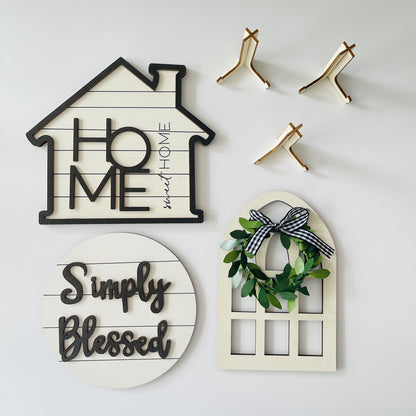 Decorative home signs with 'HOME sweet HOME', 'Simply Blessed', and a wreath design on a white background.