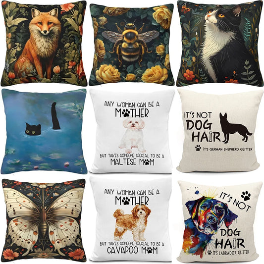 Collection of decorative pillows with various designs including animals, text, and patterns.
