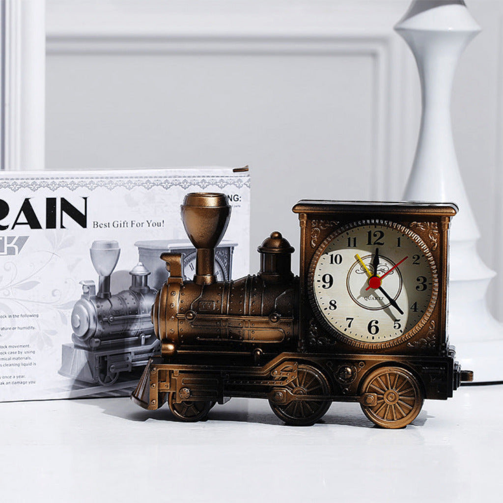 Vintage train clock with a magazine in the background