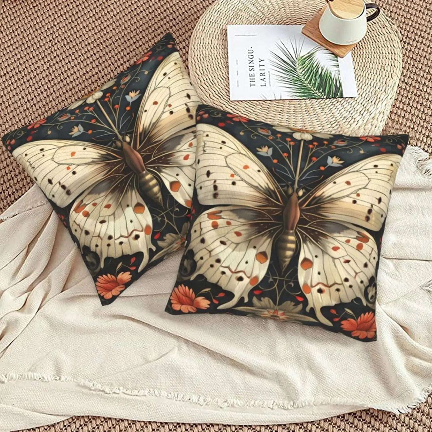 Butterfly-themed decorative pillows on a textured surface with a woven mat and cup in the background.