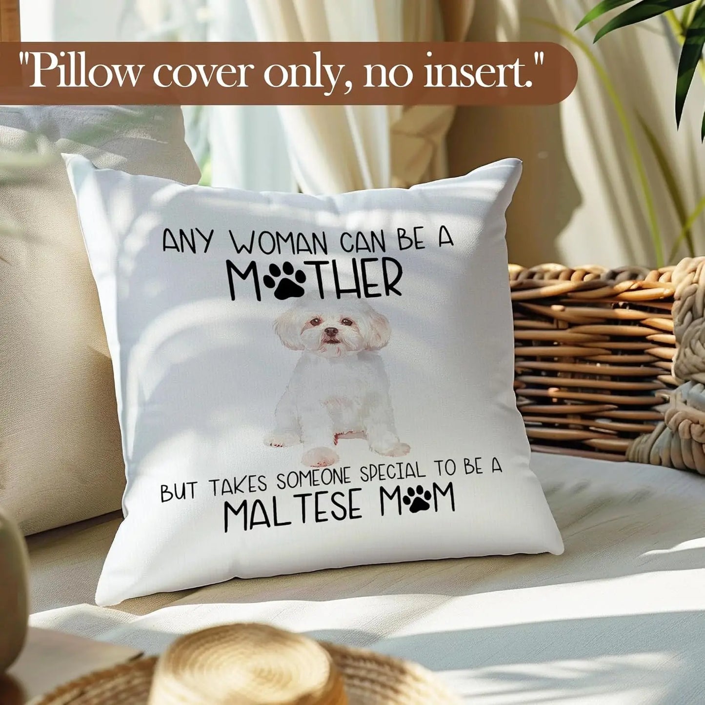 White pillow cover with a Maltese dog illustration and text on a couch.