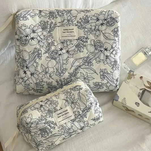 Floral-patterned pouches on a light background