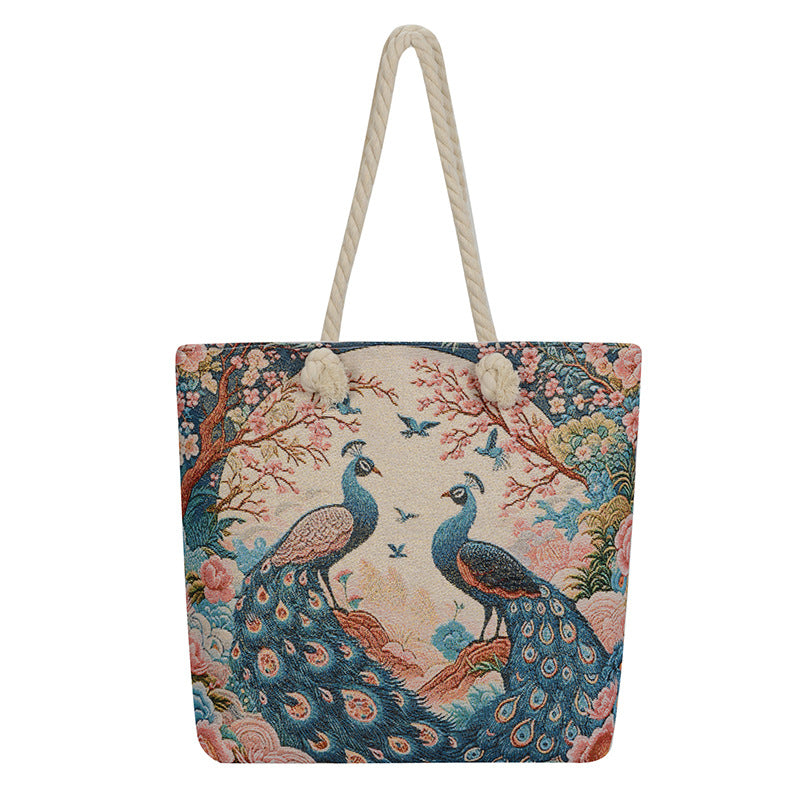Tote bag with peacock design on a white background