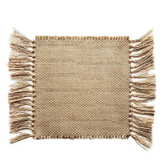 Beige woven placemat with fringe on a white background