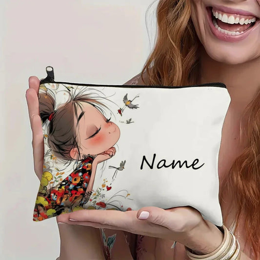 Person holding a pouch with an illustration of a girl and the word 'Name' on it.
