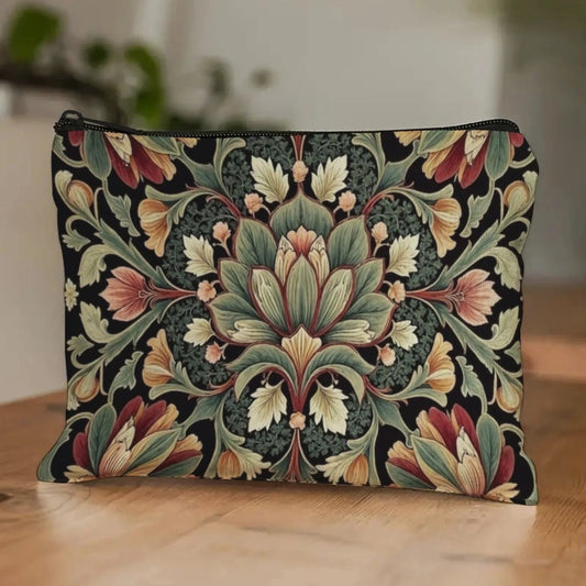 Decorative pouch with intricate floral pattern on a wooden surface
